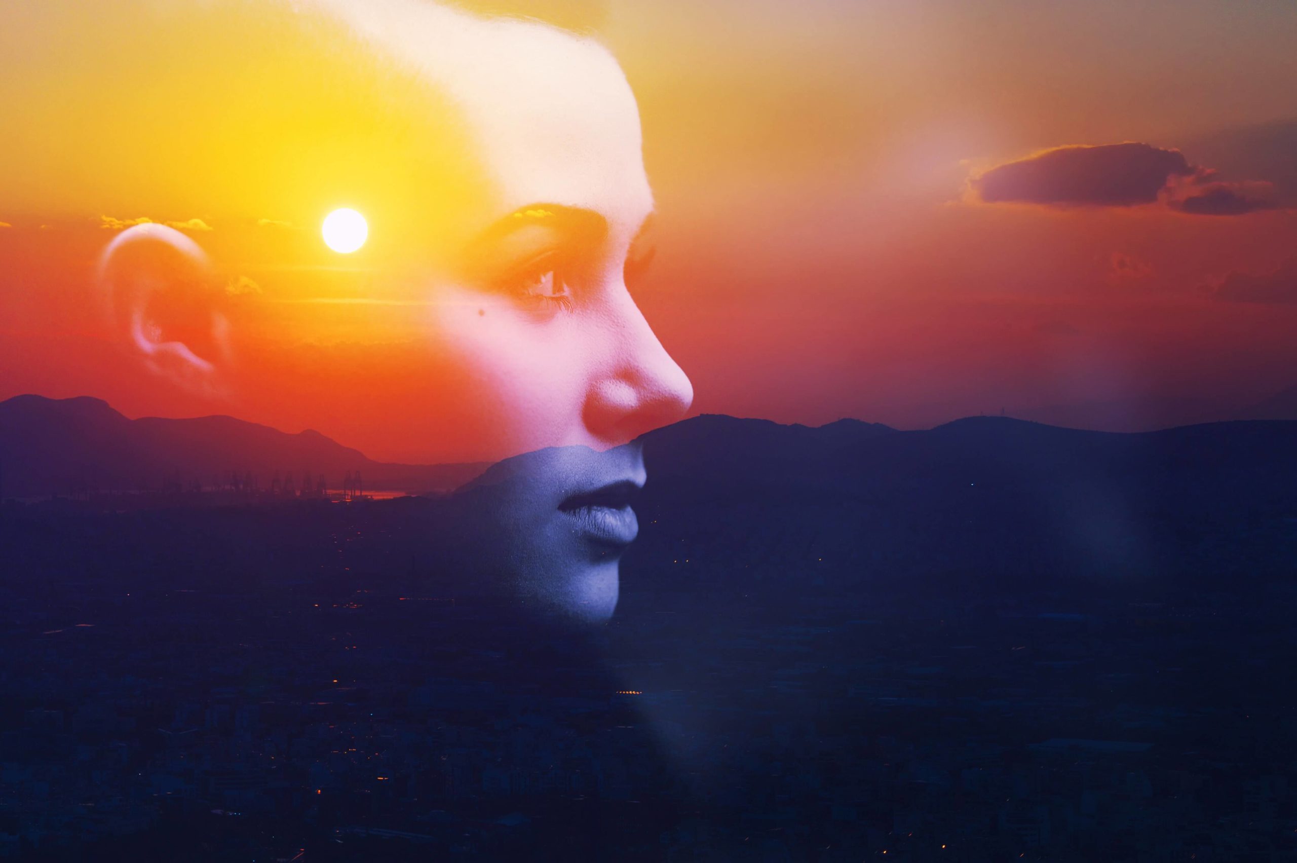 silhouette of a woman over a sunrise depicting holistic treatment