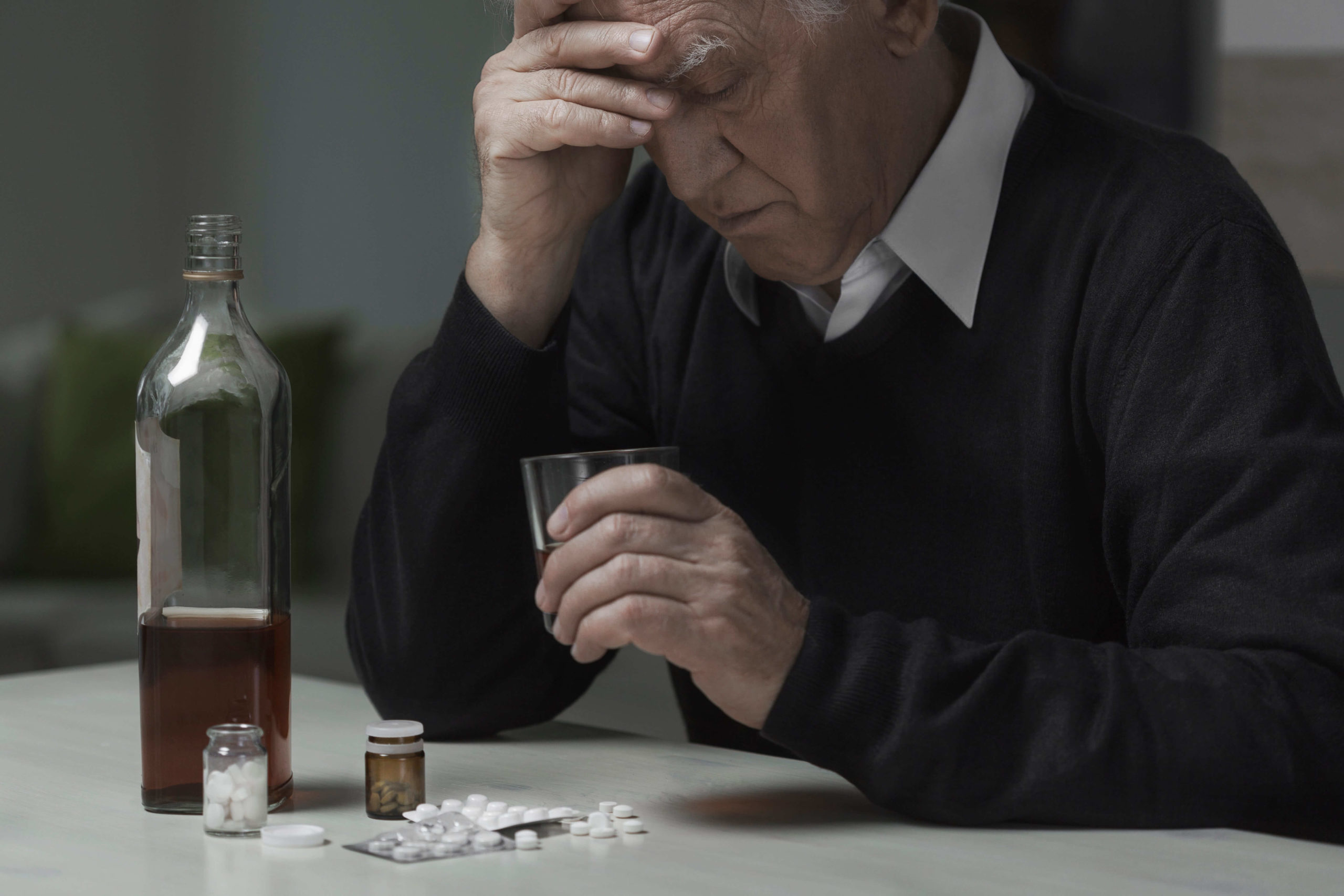 elderly man drinking alcohol and abuse drugs